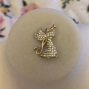 Sparkling gold tone angel brooche
